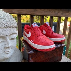 Red and white Nik Air Force 1’s